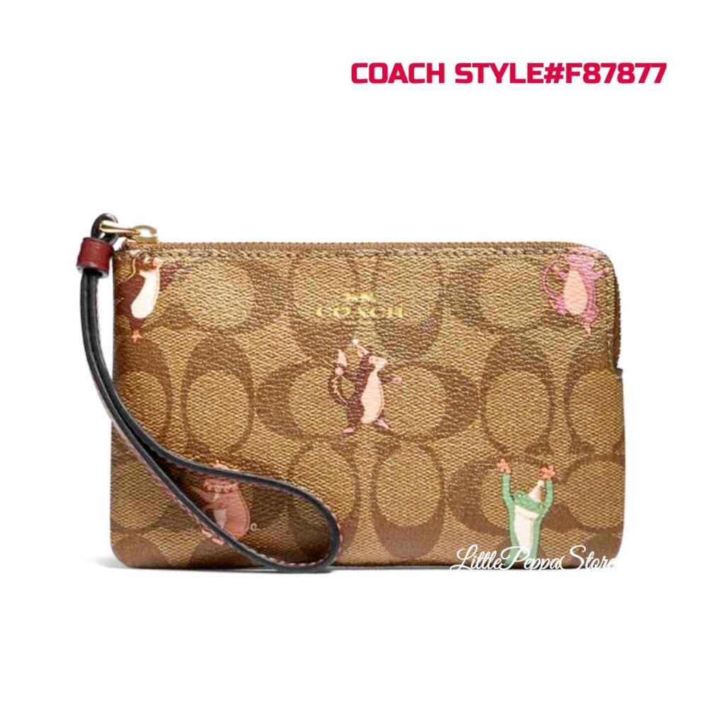 COACH CORNER ZIP WRISTLET SIGNATURE PARTY ANIMALS